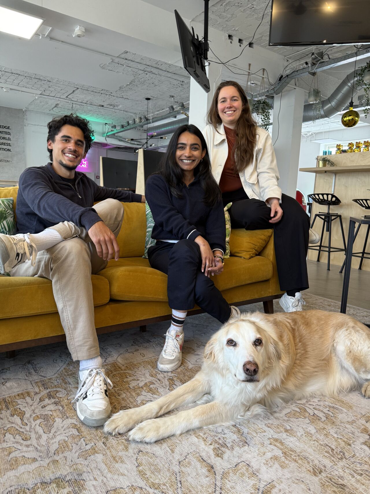 Ops Starters team on a yellow couch